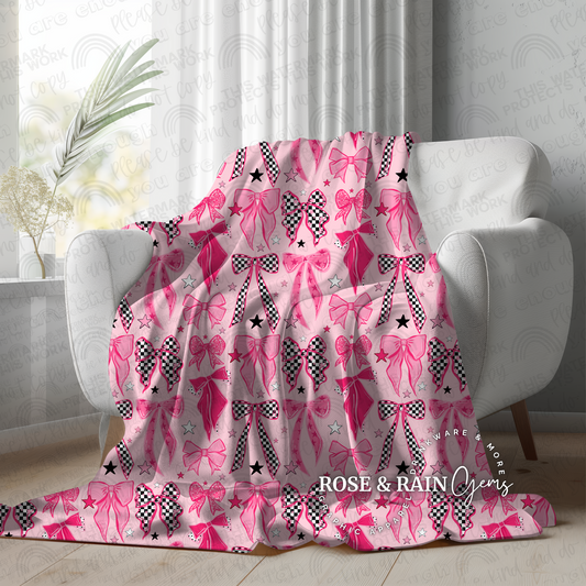 Pink and checkered bose blanket